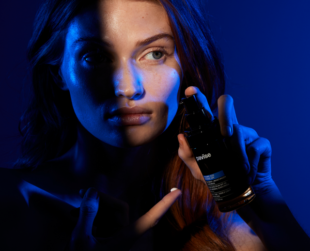 Woman using Dynamic Age Defense SPF