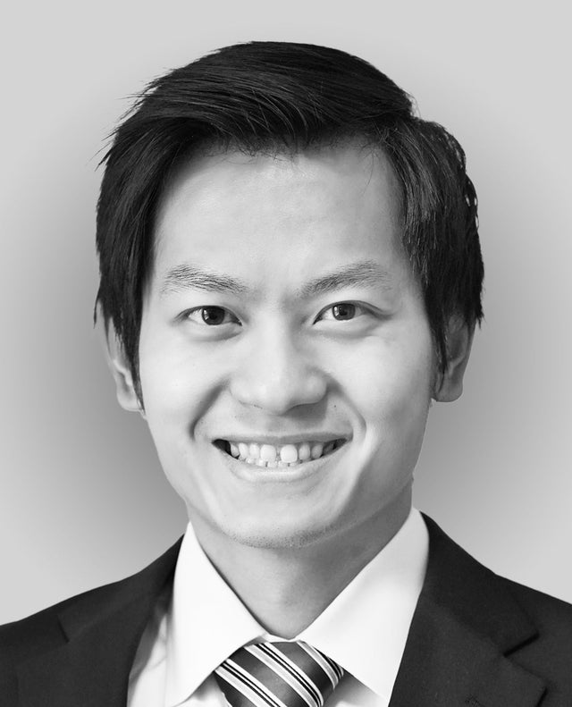 Black and white headshot of Dr. Joe Tung