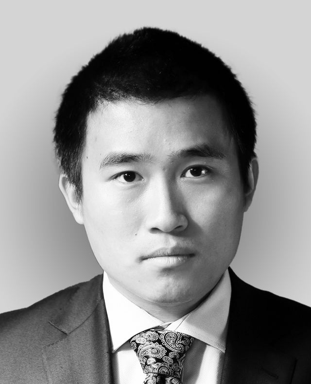 Black and white headshot of Dr. Jiajun Yan